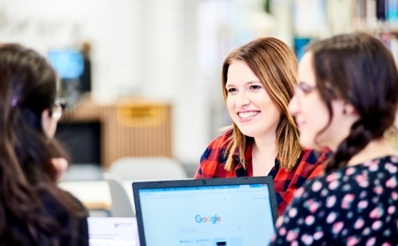 Two students with laptop